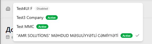 3–4 şirkətin siyahısını göstərən şirkət dəyişdiricisi açılan menyusu açıq başlıq, hər biri status nişanı ilə (yaşıl rəngdə "Aktiv"). Bu məqalənin əksər oxucularının görəcəyini təmsil etmək üçün adi çoxşirkətli istifadəçi hesabı istifadə edin — admin yox. Yuxarı sol küncdəki mövqeyinin aydın olması üçün kifayət qədər ətraf başlıq konteksti daxil edin.